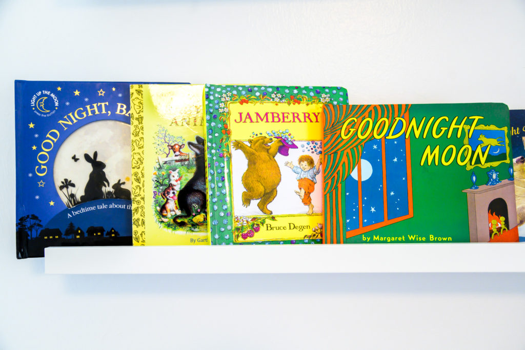 picture of baby's first book shelf with goodnight moon and other children's books